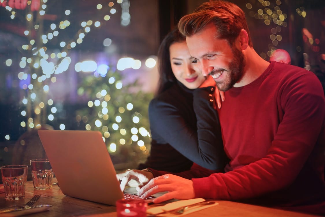 couple shopping on computer