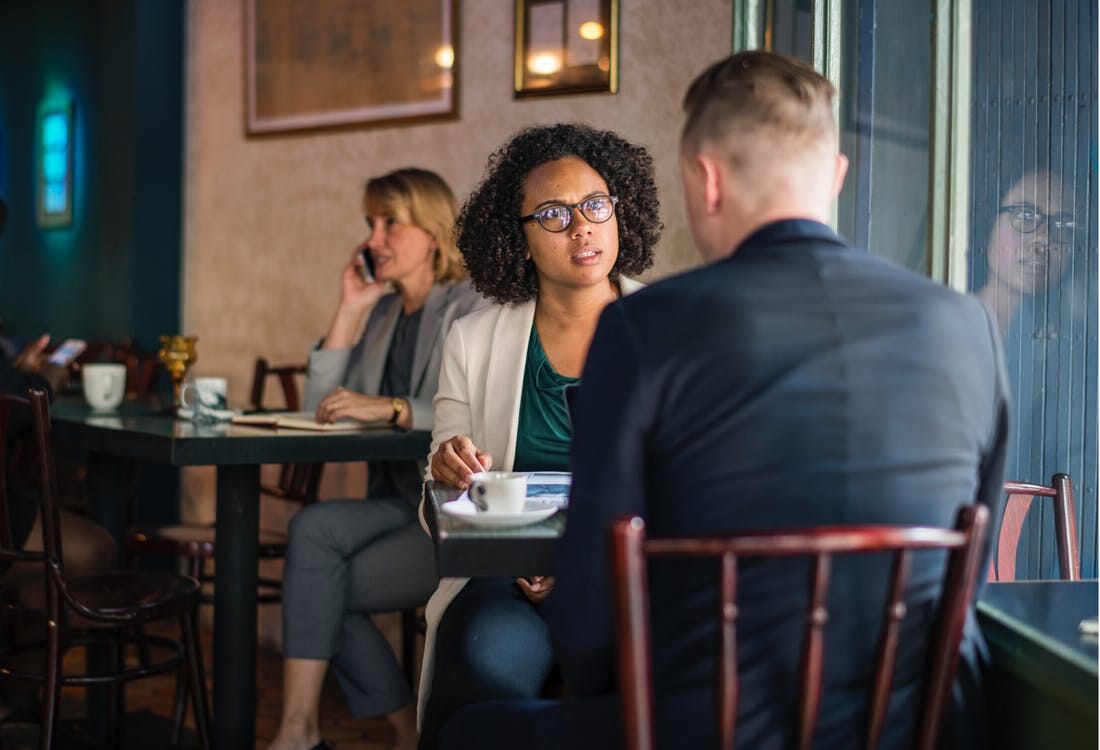 couple sitting in coffee