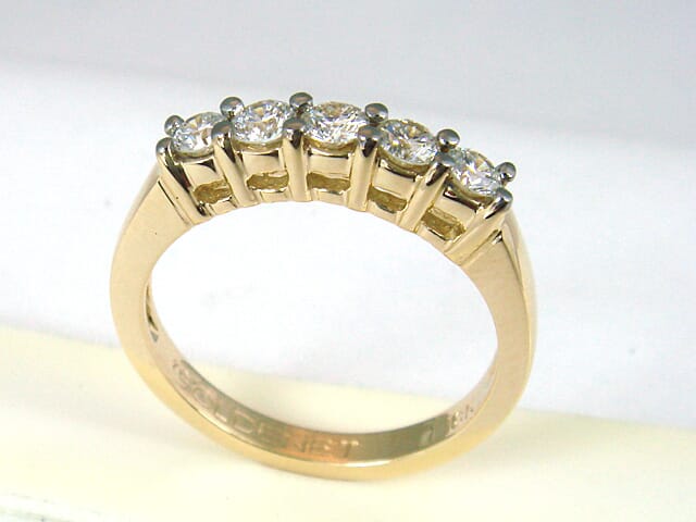 14k white gold ring with 5 diamonds