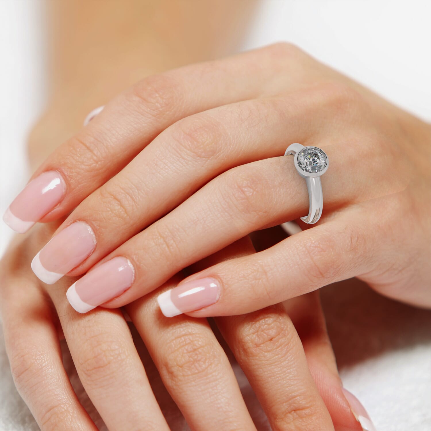 Bezel solitaire store ring